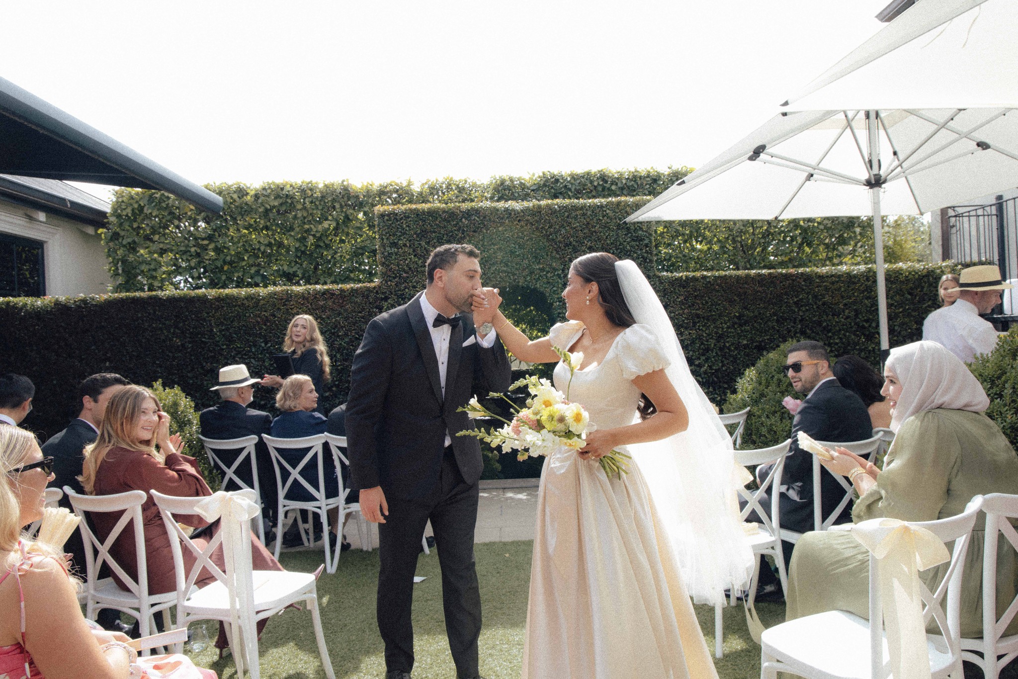Wedding couple photographed outdoors